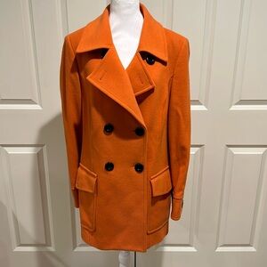 Striking orange wool coat made by Tribal. Size 12.